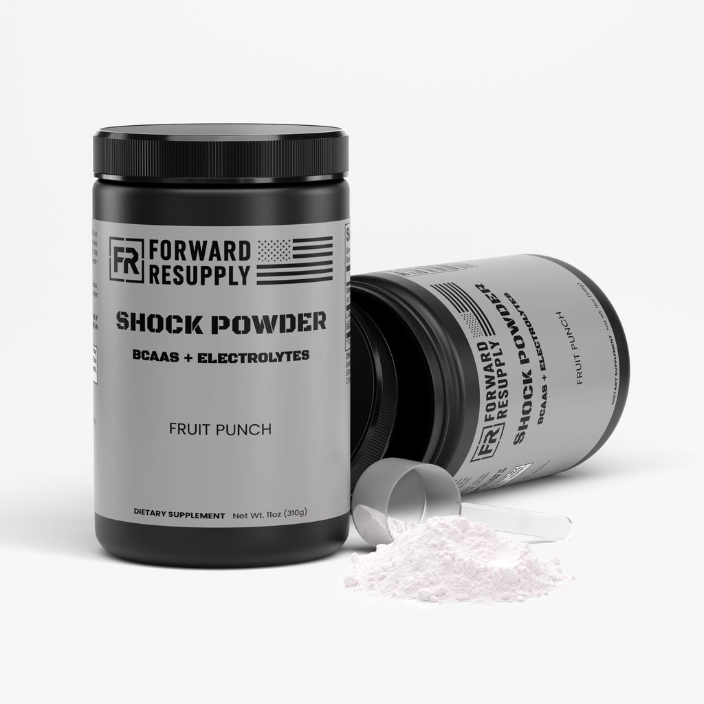 Two shock powder supplement jars with black lids and white powder on surface