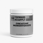 Creatine monohydrate supplement jar with white lid and gray front label